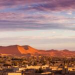 Experience the stunning beauty of Merzouga’s desert dunes on a 5 days tour from Tangier to Marrakech, including camel trekking and unforgettable desert landscapes.